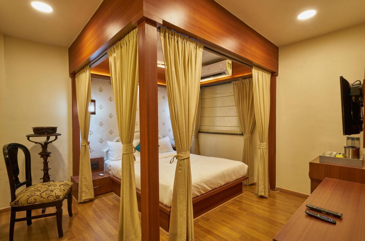 Tranquil La Casa Hotel Pune Quarto foto